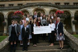Year 11s present a cheque for £927.14 to Prospect Hospice